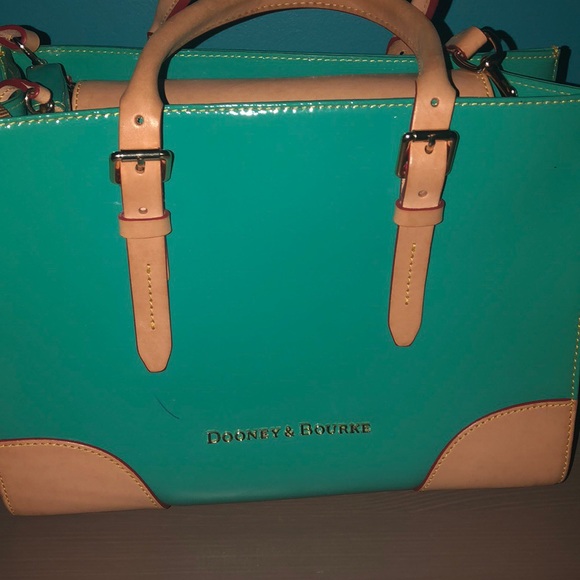 Dooney & Bourke Handbags - Dooney & Bourke. There is a small ink mark. 13x9